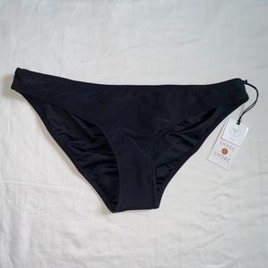 BLACK bathing suit bottom. (S 4-6). CHEEKY style.